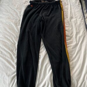 Aviator Nation Black Track Pants with Yellow & Orange Side Stripes